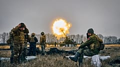 FILE - Ukrainian soldiers fire a Pion artillery system at Russian positions near Bakhmut, Donetsk region, Ukraine, Friday, Dec. 16, 2022.