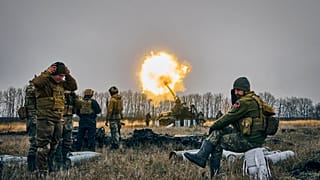 FILE - Ukrainian soldiers fire a Pion artillery system at Russian positions near Bakhmut, Donetsk region, Ukraine, Friday, Dec. 16, 2022.