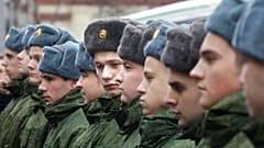 Russian military conscripts line up at a conscription point in Moscow, Friday, Nov. 26, 2010. 