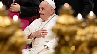 Pope Francis arrives for leading a prayer for peace inside St. Peter's Basilica at The Vatican on Friday