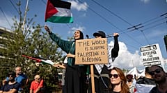 Pro Palestinian protesters take part in a rally outside the Israeli embassy in Athens, Greece, Sunday, Oct. 29, 2023.