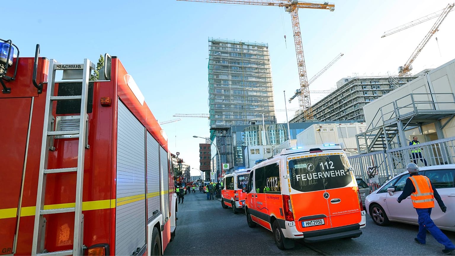Emergency services near the scene of an incident, at a construction site, in Hamburg's HafenCity, Germany, Monday, Oct. 30, 2023.