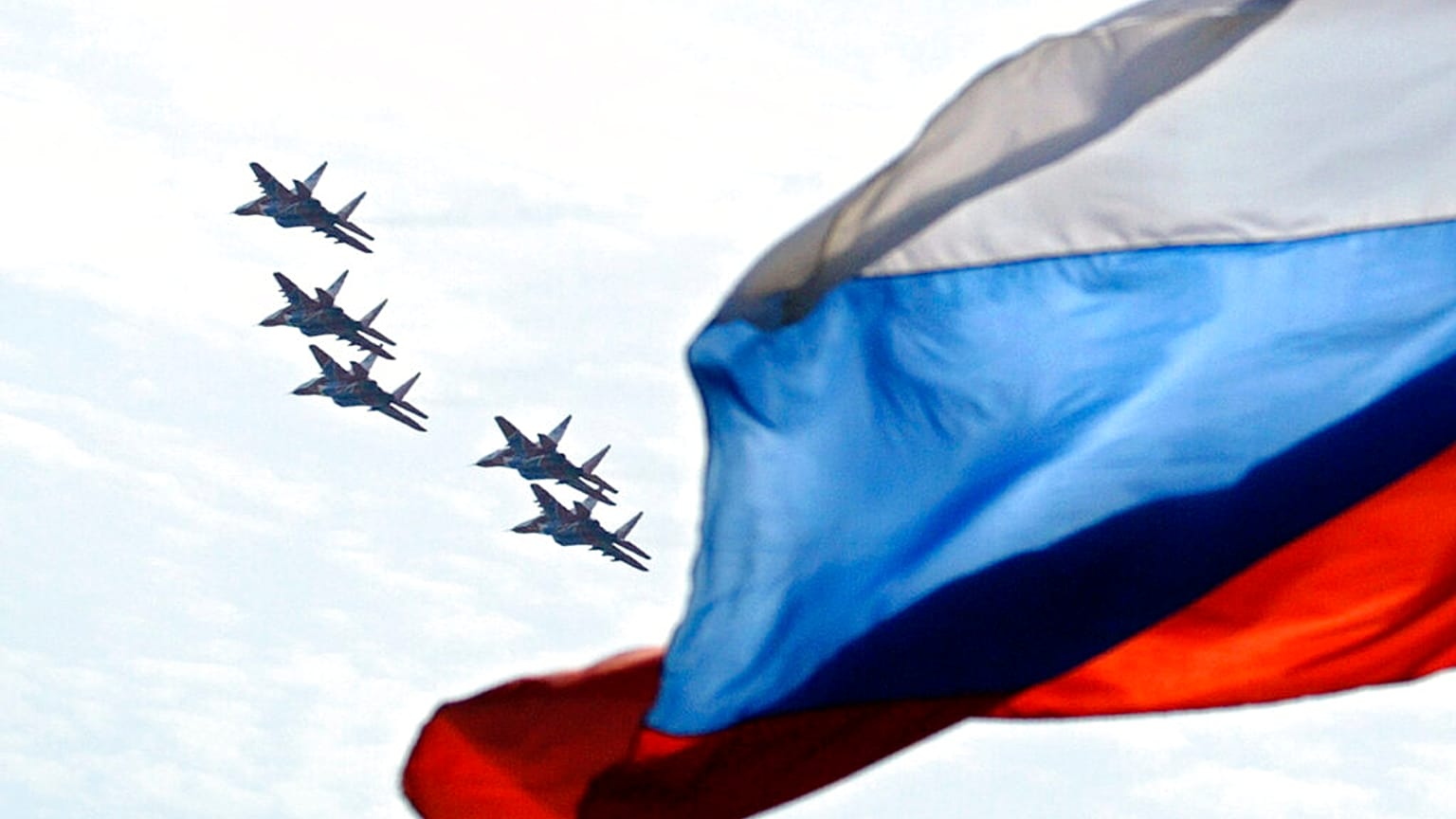 FILE - Russian pilot group Strizhi of 5 of MIG-29 performs during the Moscow International Aviation and Space Show, 2007.