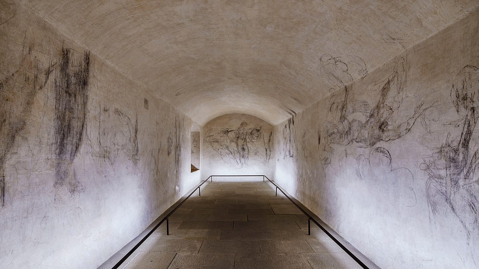 Delicate charcoal drawings that some experts have attributed to Michelangelo are seen on the walls of a room used to store coal until 1955 inside Florence's Medici Chapel