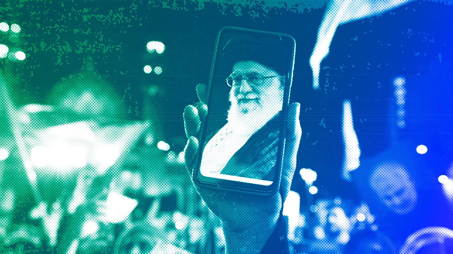 An Iranian demonstrator shows a photos of the Supreme Leader Ayatollah Ali Khamenei on the screen of her cellphone in Tehran, October 2023