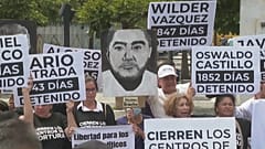 Namen und Portraits von politischen Gefangenen in Venezuela