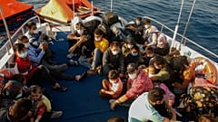 Migranten auf einem Boot