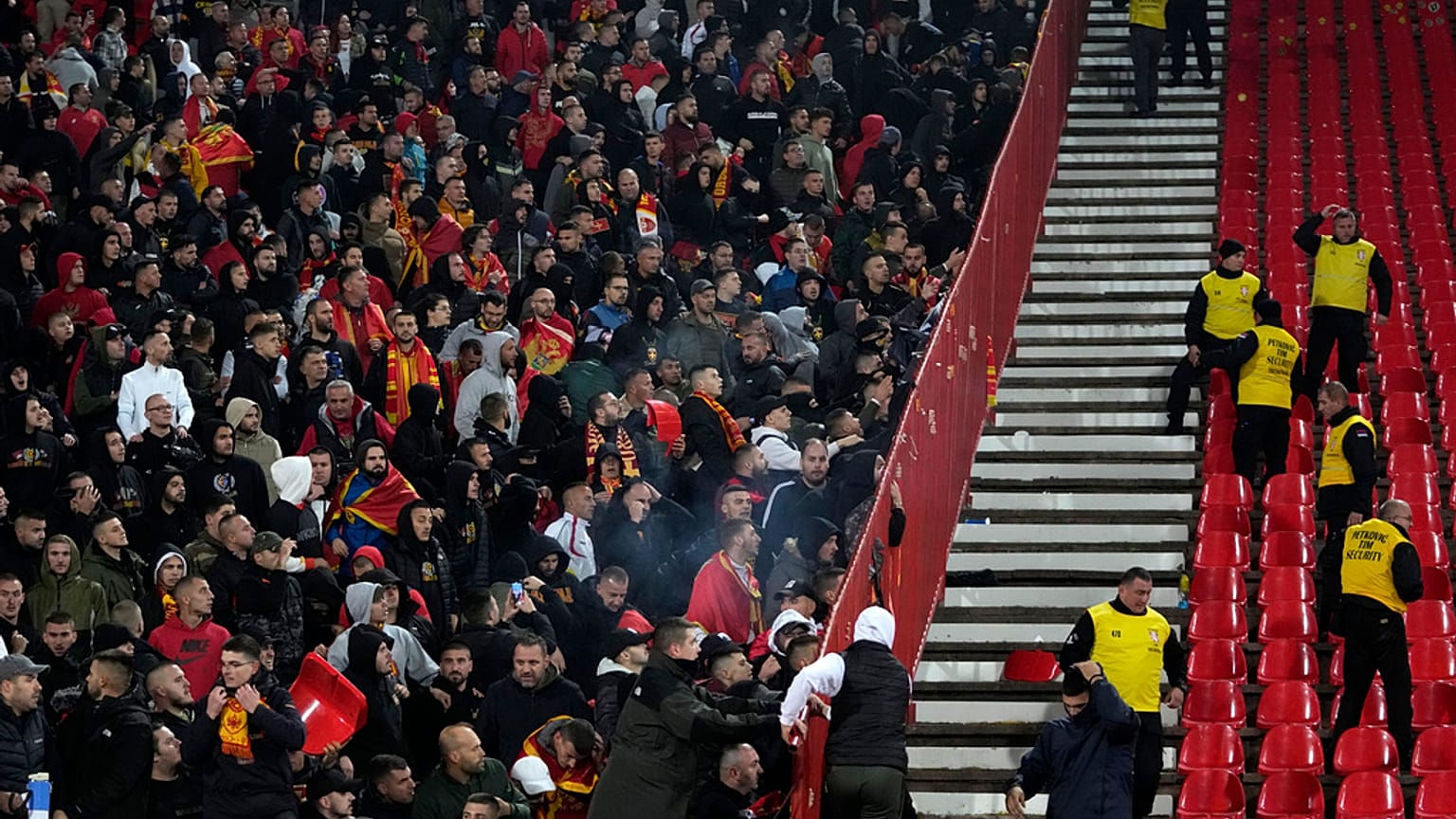 Fans shout during the Euro 2024 group G qualifying soccer match between Serbia and Montenegro, at the Rajko Mitic Stadium in Belgrade, Serbia, Tuesday, Oct. 17, 2023.