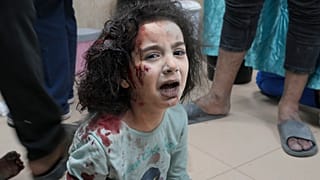 Palestinian child wounded in Israeli bombardment is brought to a hospital in Deir al Balah, south of the Gaza Strip, Thursday, Nov. 2, 2023.