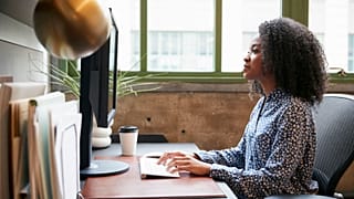A worker at a computer