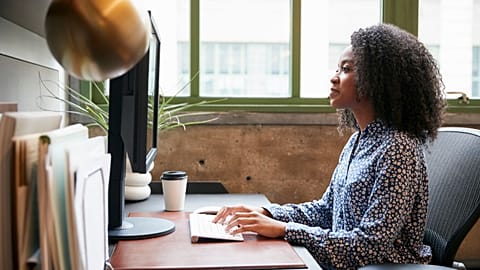 A worker at a computer