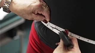 A waist being measured.