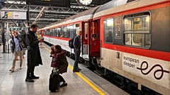 People say goodbye before boarding the first European Sleeper train to Berlin, at the Midi Station in Brussels, Belgium, 26 May 2023. 