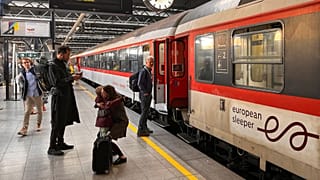 People say goodbye before boarding the first European Sleeper train to Berlin, at the Midi Station in Brussels, Belgium, 26 May 2023.