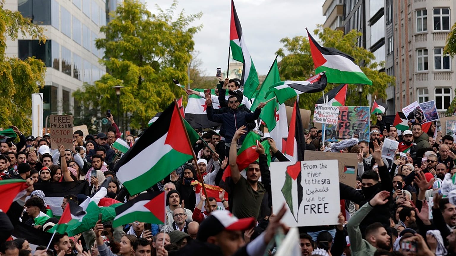 Protestors march during a demonstration, in solidarity with the Palestinian people in Gaza.