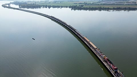 The floating train travels along Pasak Jolasid Dam, Thailand’s biggest reservoir in Lopburi province.