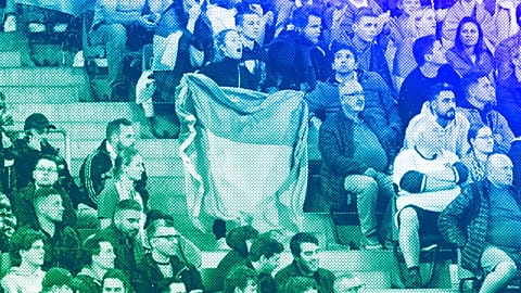Donetsk fans wave Ukraine flags during the UEFA Champions League match in Hamburg, September 2023