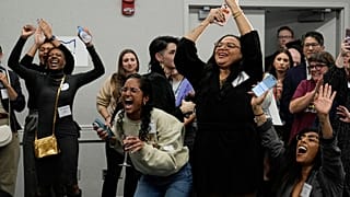 Issue 1 supporters celebrate as Rhiannon Carnes, executive director, Ohio Women's Alliance, speaks at a watch party, Tuesday, Nov. 7, 2023, in Columbus Ohio