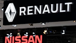 Renault and Nissan automobile logos.