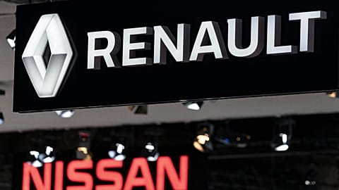 Renault and Nissan automobile logos.