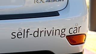 Image shows a self-driving car. The UK government has indicated it will introduce legislation to regulate and develop the autonomous vehicle industry.