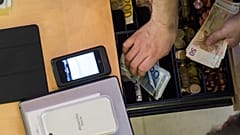 Apple iPhone with cash register