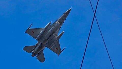 Romanian air force F16 fighter jet flies during the National Day parade in Bucharest, Romania, Thursday, Dec. 1, 2016
