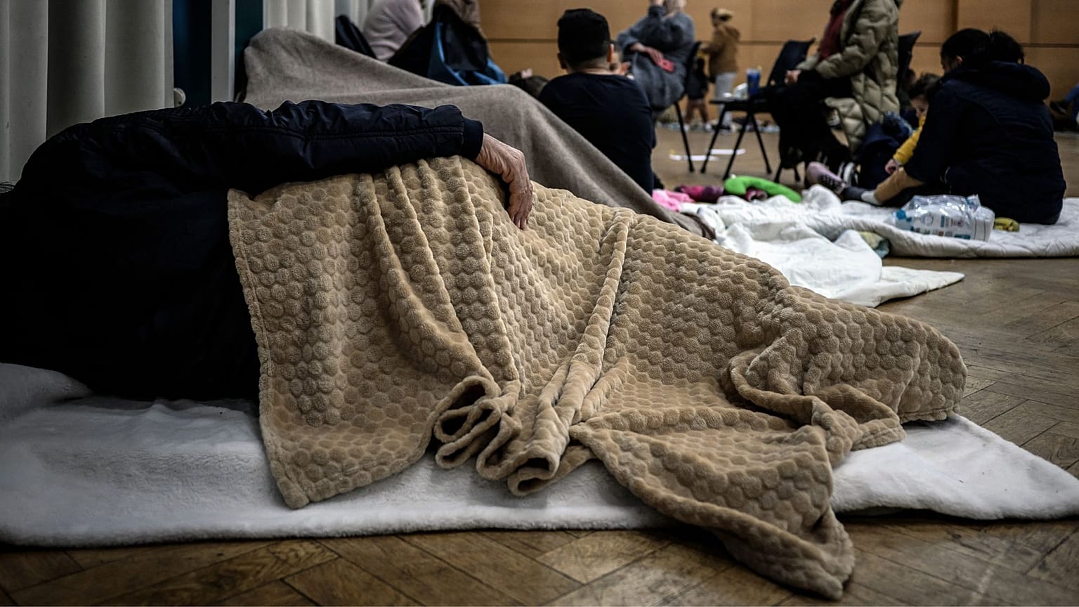 Members of the "Collective for solidarity between homeless women" occupy the cultural centre of the association life as a shelter in Villeurbanne, France, 9 Nov 2023