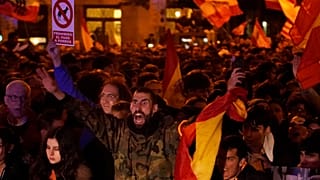 Demonstrators gather to protest against the amnesty at the headquarters of Socialist party in Madrid