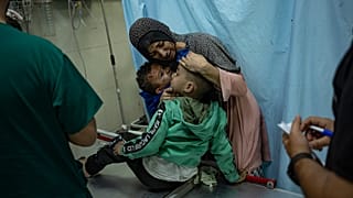 Palestinians wounded in Israeli bombardment of the Gaza Strip are brought to a hospital in Khan Younis, Wednesday, Nov. 15, 2023.