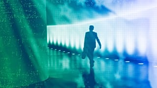 A man walks through the underground connection between the Reichstag building and the Paul Loebe House in Berlin, July 2022