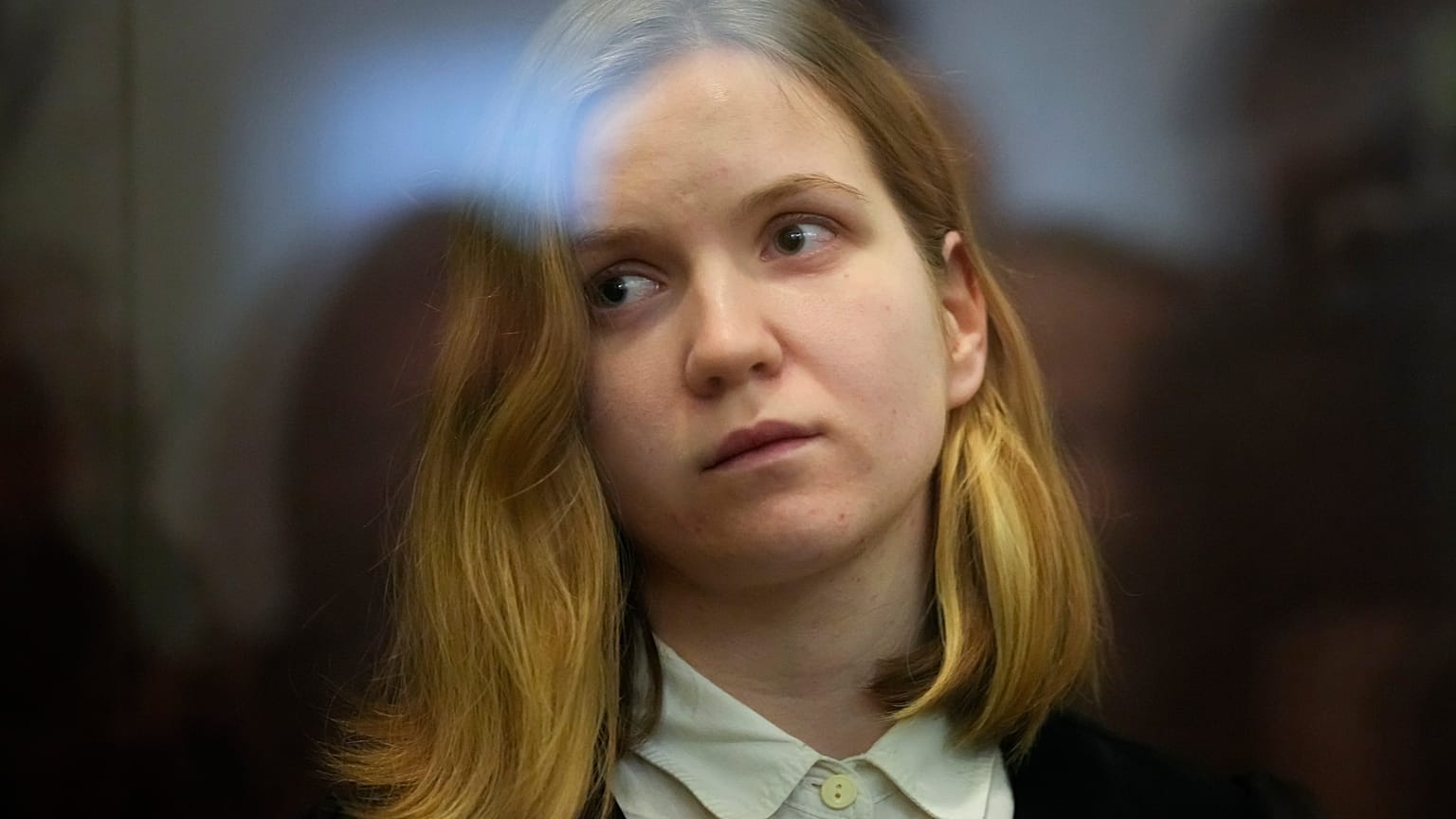 Suspect Darya Trepova stands in a glass cage as she attends a court hearing in the 1st Western District Military Court, in St. Petersburg, Russia on Wednesday