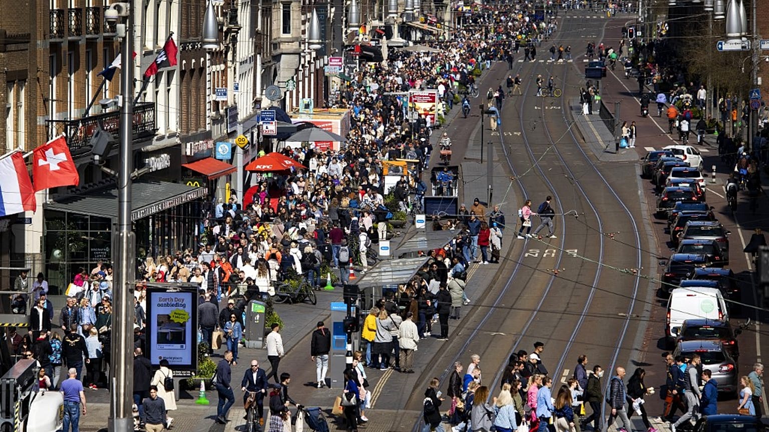 People stroll in the center of Amsterdam, Netherlands, on April 16, 2022.