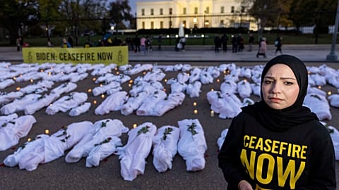 Fake white body bags, representing those killed in the escalating conflict in Gaza and Israel, in front of the White House