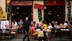 Clients eat at a Bouchon, a traditional Lyon restaurant, on July 28, 2023.