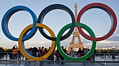 Image shows the Olympic rings with the Eiffel Tower in the background. New security technology was displayed in Paris ahead of the 2024 Games.