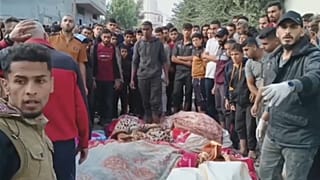 فلسطينيون وسط الحطام والجثث عقب قصف إسرائيلي لمخيم النصيرات في غزة