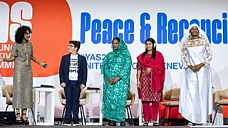 Francisco Vera and Nisreen Elsaim on stage at the Young Activists Summit