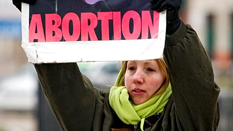 FILE - A protesters outside a women's health care service clinic in the US, 2008. 