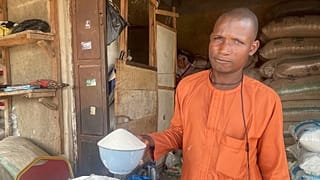 Isa Ahmed sells sugar at his shop at a market in Abuja, Nigeria: Sugar worldwide is trading at the highest prices since 2011.