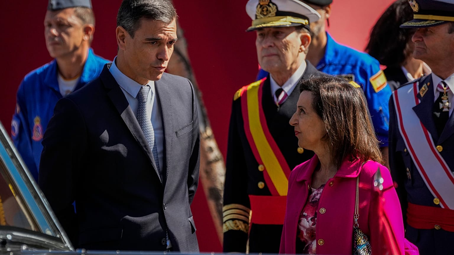 Spain's Prime Minister Pedro Sanchez, left, talks with Spain's Defense Minister Margarita Robles.