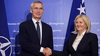 NATO Secretary General Jens Stoltenberg shakes hands with the President of the Council of Ministers of Bosnia and Herzegovina Borjana Kristo