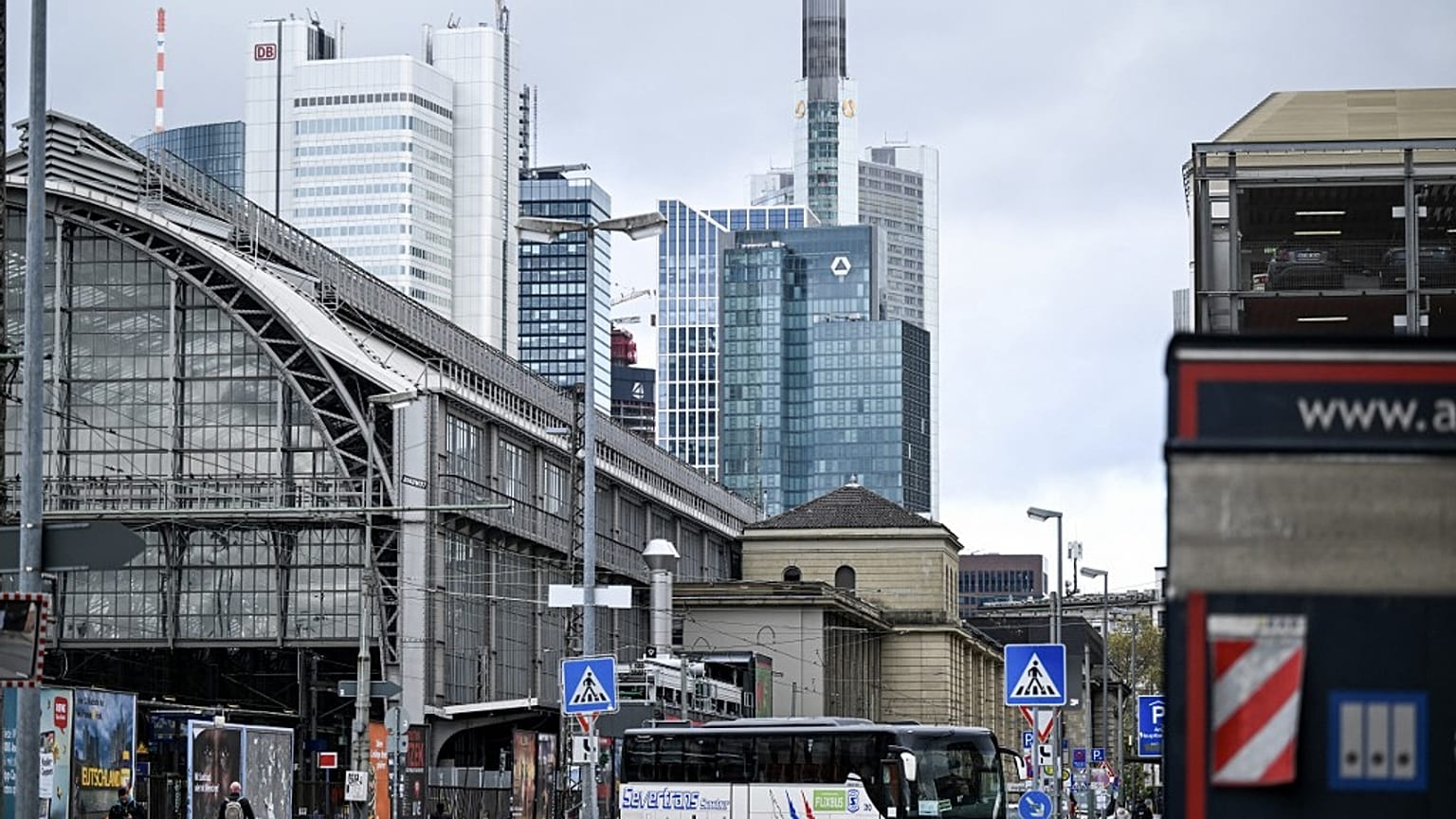 A bus turns on a street outside the main railway station and banking district in Frankfurt am Main, western Germany, on November 20, 2023.