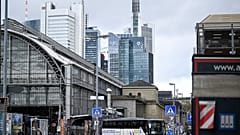 A bus turns on a street outside the main railway station and banking district in Frankfurt am Main, western Germany, on November 20, 2023.