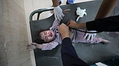 Palestinian child wounded in the Israeli bombardment of the Gaza Strip is treated at al Aqsa Hospital on Deir al Balah, Gaza Strip, Tuesday, Nov. 21, 2023.
