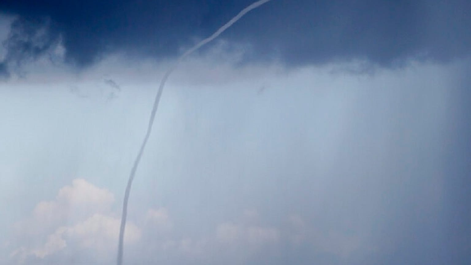 A waterspout dissipates on Lake Pontchartrain.