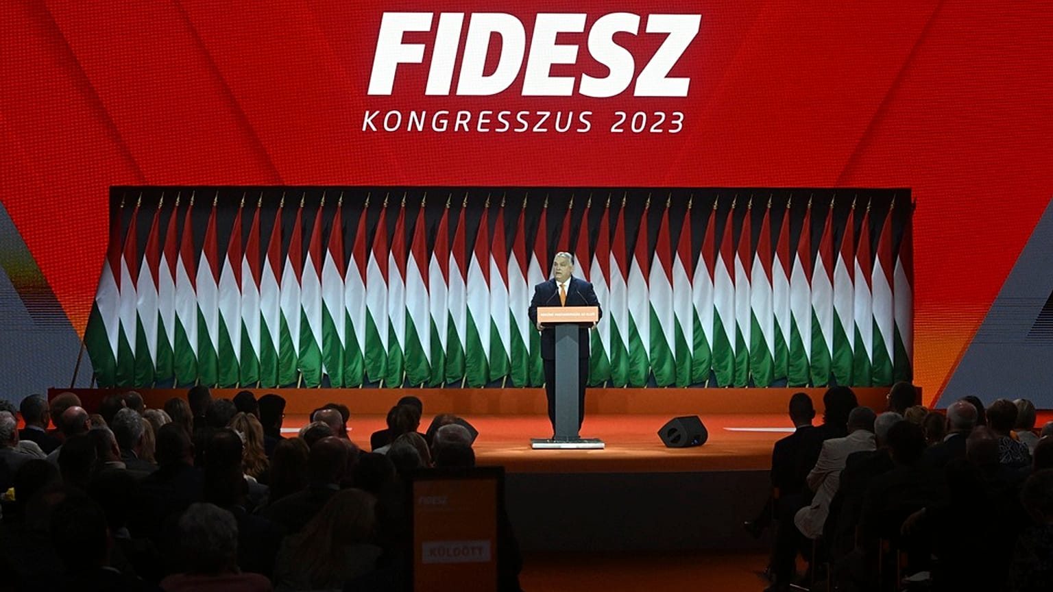 Hungarian Prime Minister Viktor Orban, center, delivers his speech after he was re-elected at the election of officials congress of the ruling Hungarian Fidesz.