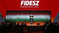 Hungarian Prime Minister Viktor Orban, center, delivers his speech after he was re-elected at the election of officials congress of the ruling Hungarian Fidesz.