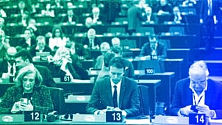 Members of the European Parliament check their smartphones in Strasbourg, January 2023