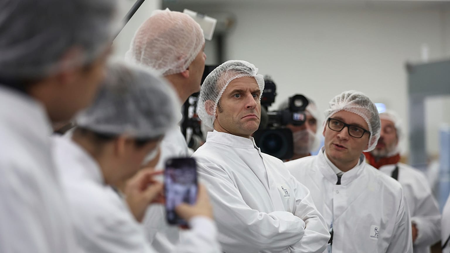 French President Emmanuel Macron visits the plant of Danish pharmaceutical company Novo Nordisk in Chartres, south west of Paris, Thursday, Nov. 23, 2023.